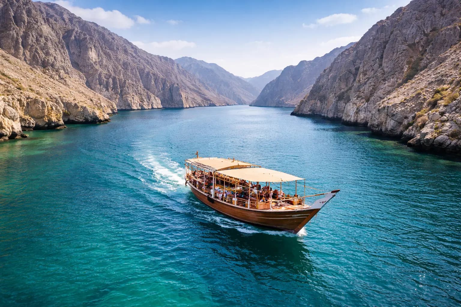 Traditional dhow cruising the Musandam fjords, Oman