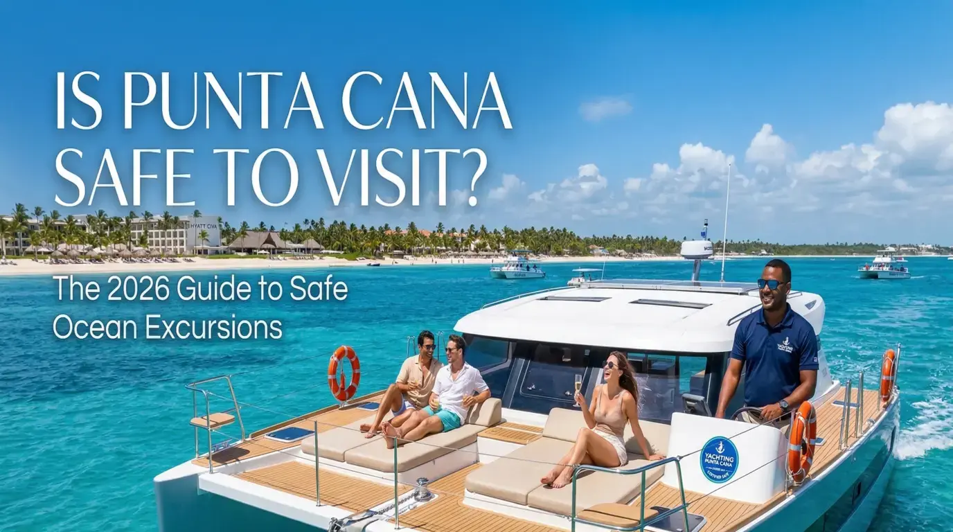 Captain steering a yacht as three guests lounge with drinks on deck off a palm-lined Punta Cana beach