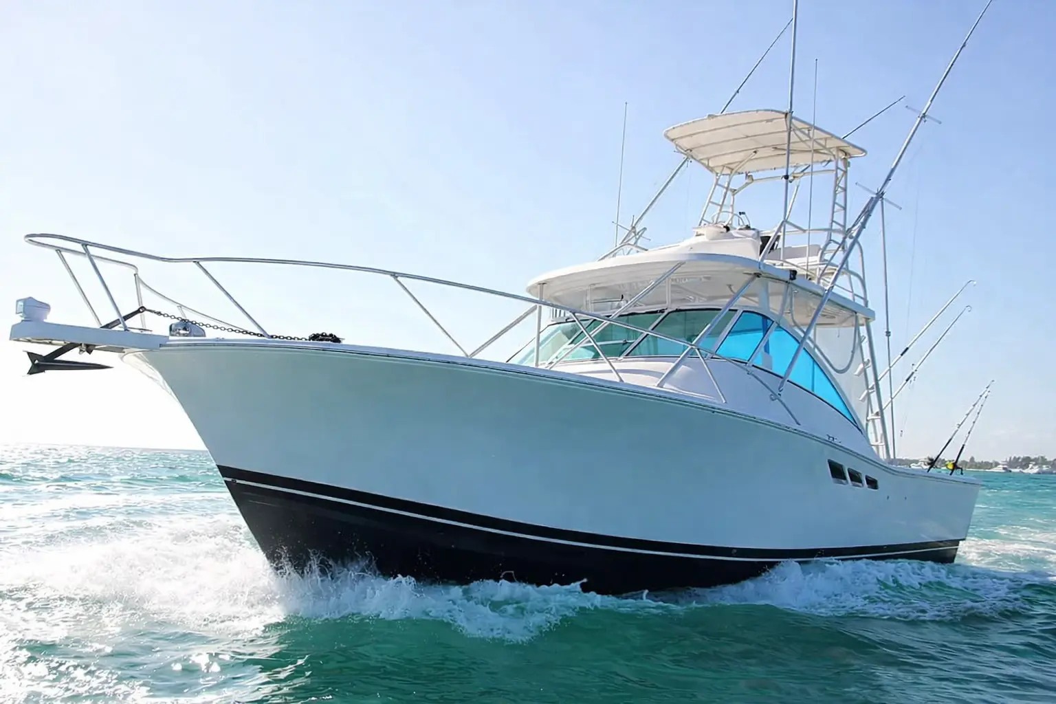 Sportfishing boat with a tuna tower speeding through the water off Punta Cana