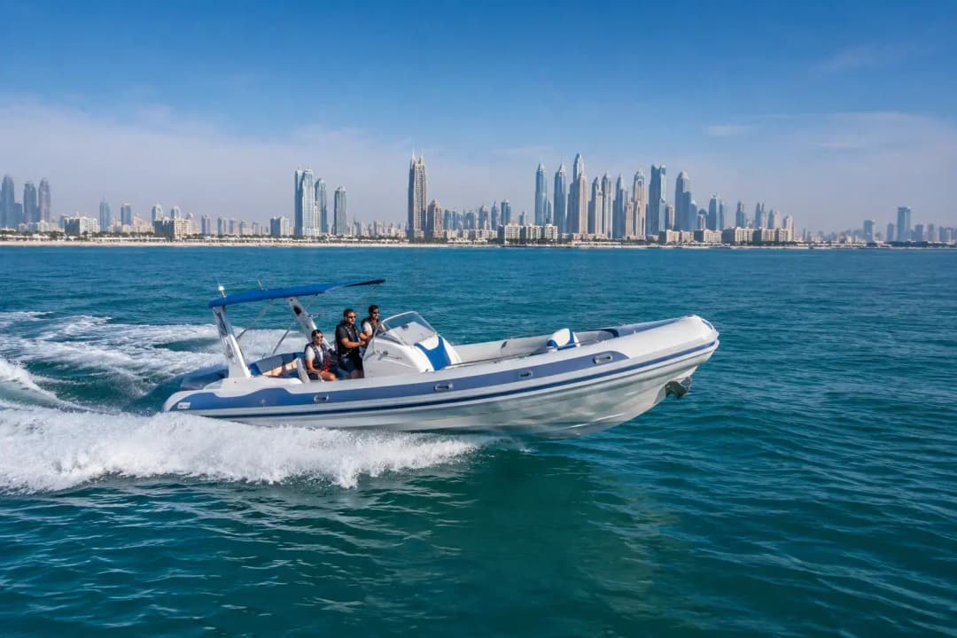 White speedboat cruising on Dubai waters with passengers and the city skyline in the background
