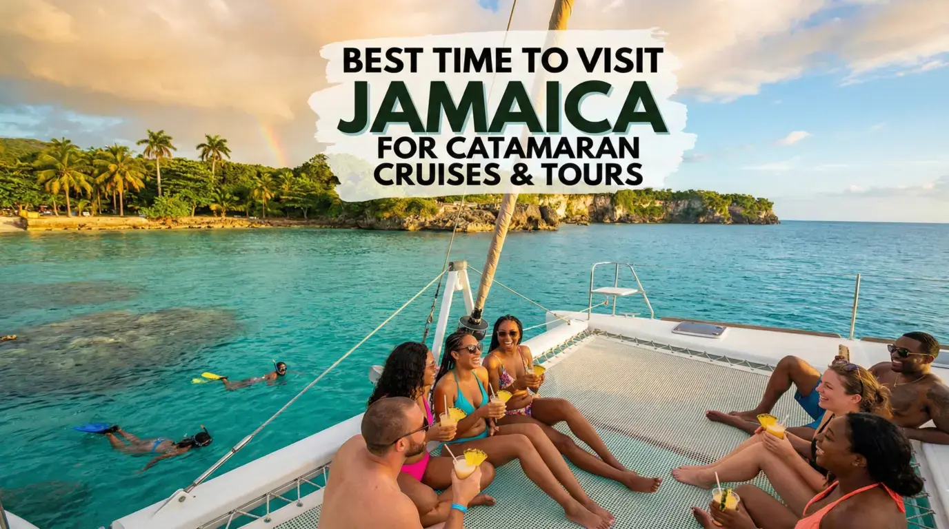 Guests with tropical drinks on a sailing catamaran's net as snorkelers swim off a palm-lined Jamaica coast