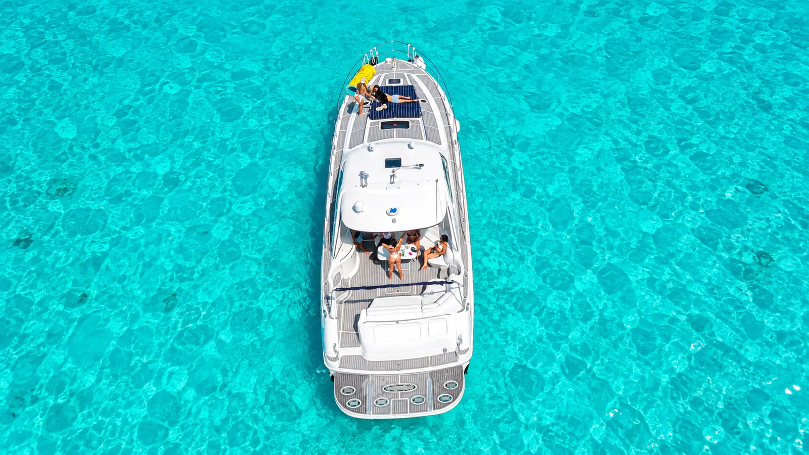 Return Cruise - Drinks and music back along the Hotel Zone to the marina, golden hour with the skyline lit on the 8-hour