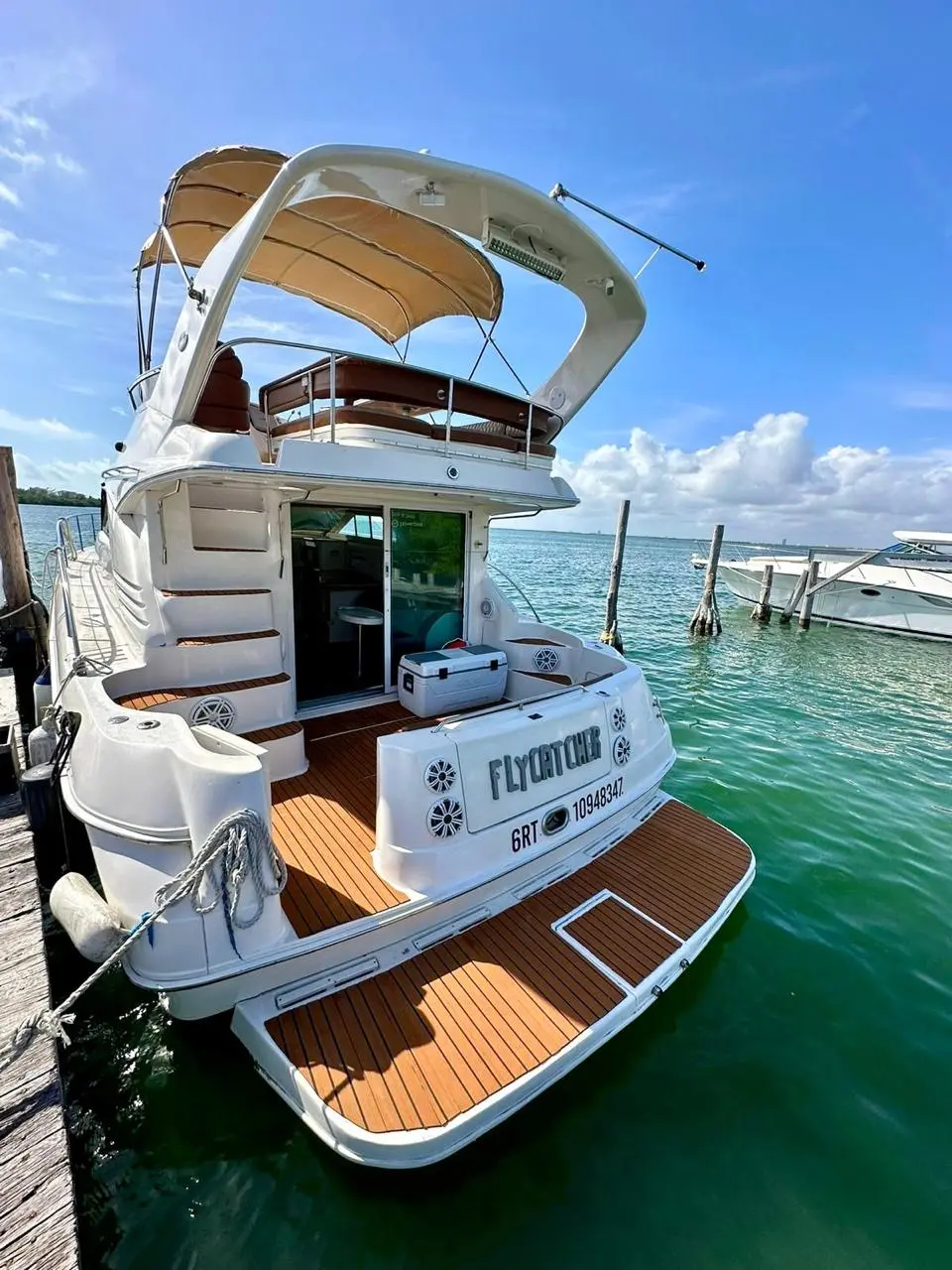 Meet the captain and crew, cooler stocked and both decks yours