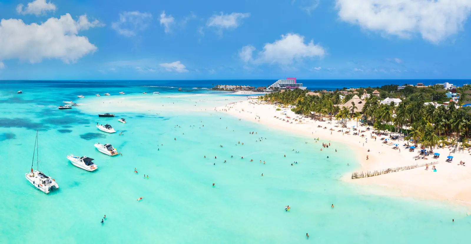 Isla Mujeres and Playa Norte (6 and 8 hours) - Anchor in the shallows to swim, float and relax, with shore time and a second stop near MUSA on the 6-hour. The 8-hour adds the Punta Sur cliffs