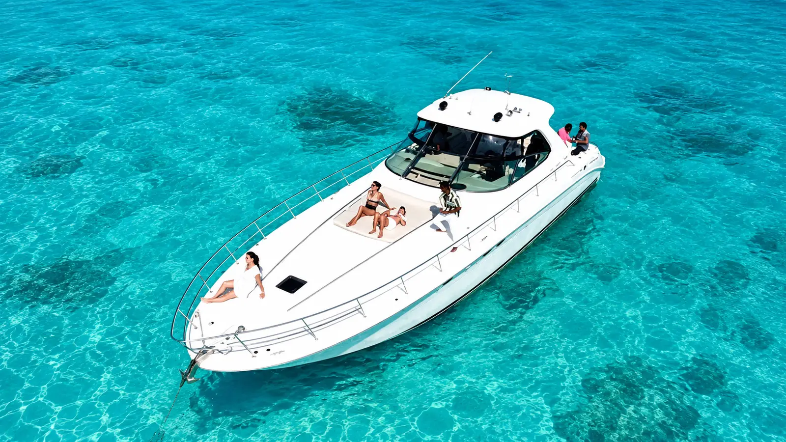 Meet the captain and crew, cooler stocked, cockpit lounge, bow pad and saloon all yours