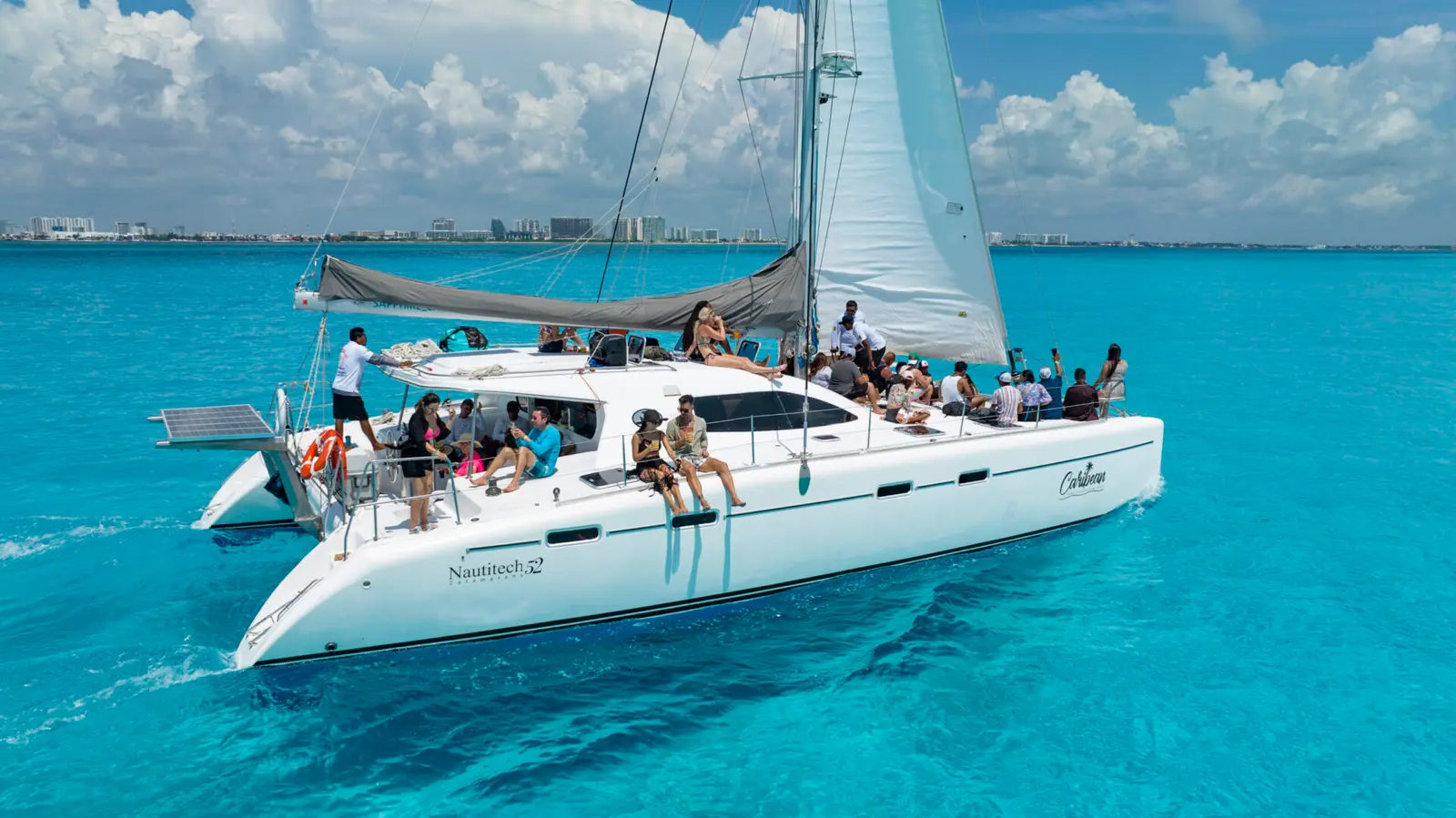 Cancun Bay Sailing - Sail across the turquoise waters while enjoying the open bar and relaxing onboard.