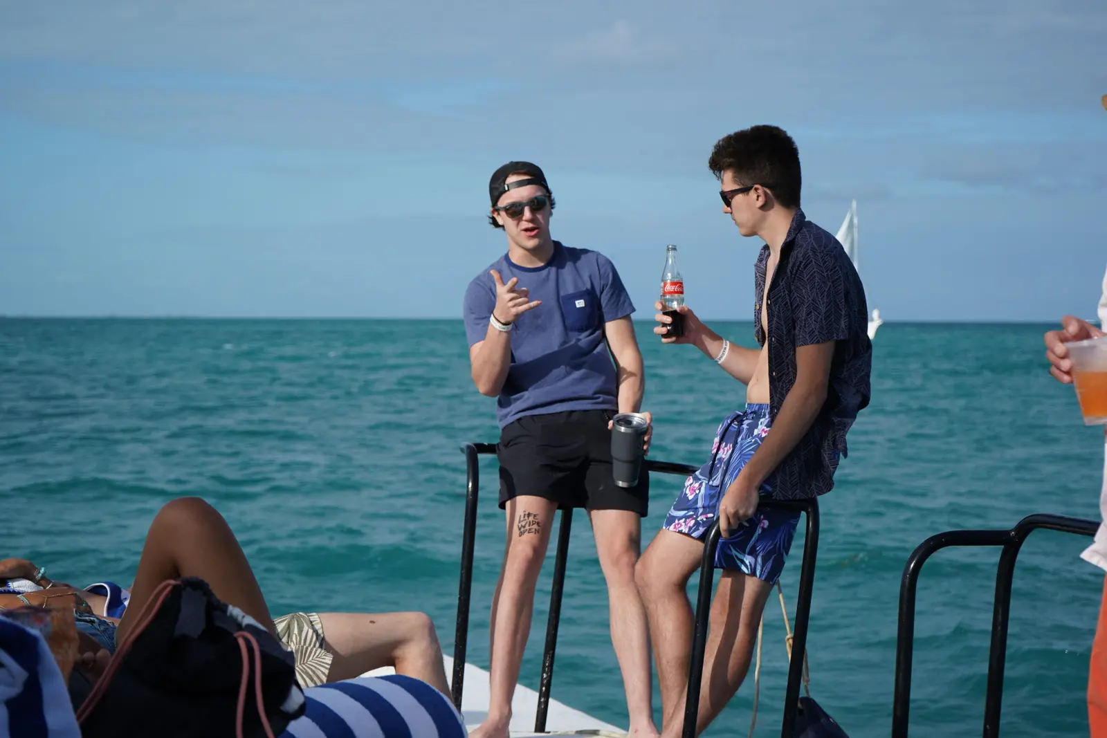 Cruising the Belize Barrier Reef  Relax with premium drinks and panoramic views as you sail across crystal-clear water