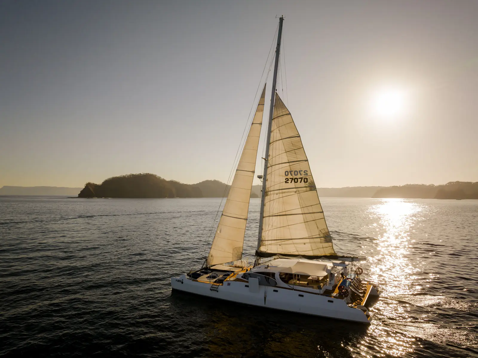 Tacos, Toasts & Sunset Taco bar out (Full Day), music up, and a golden-hour cruise home.