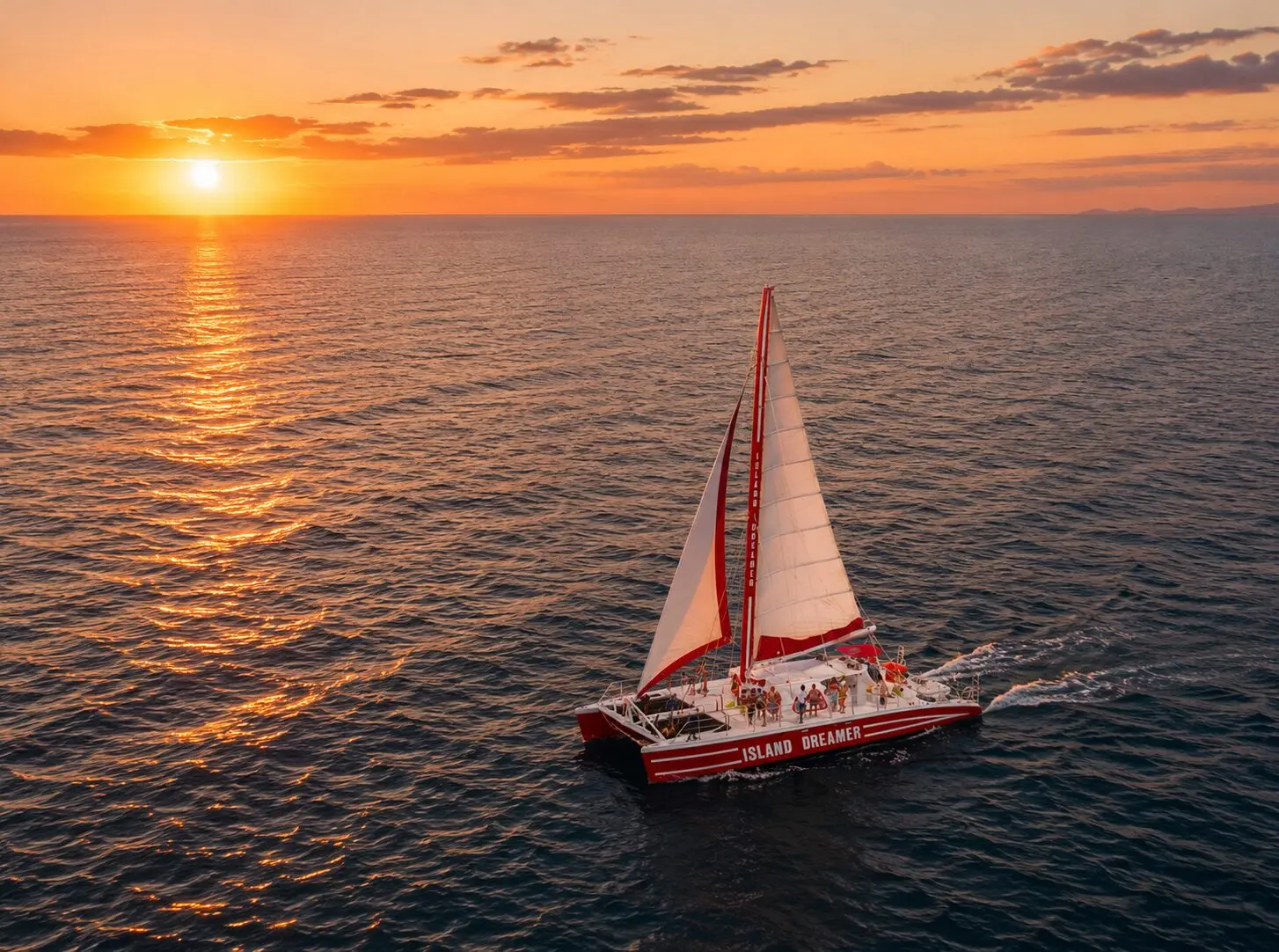 Set Sail at Sunset — Board the private Island Dreamer and cruise the coastline to the best sunset spots.