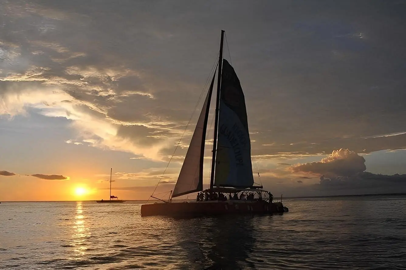 Return Sail to Samaná Back onboard for the return under sail. Music, easy light, the kind of late-afternoon crossing the day was built for.