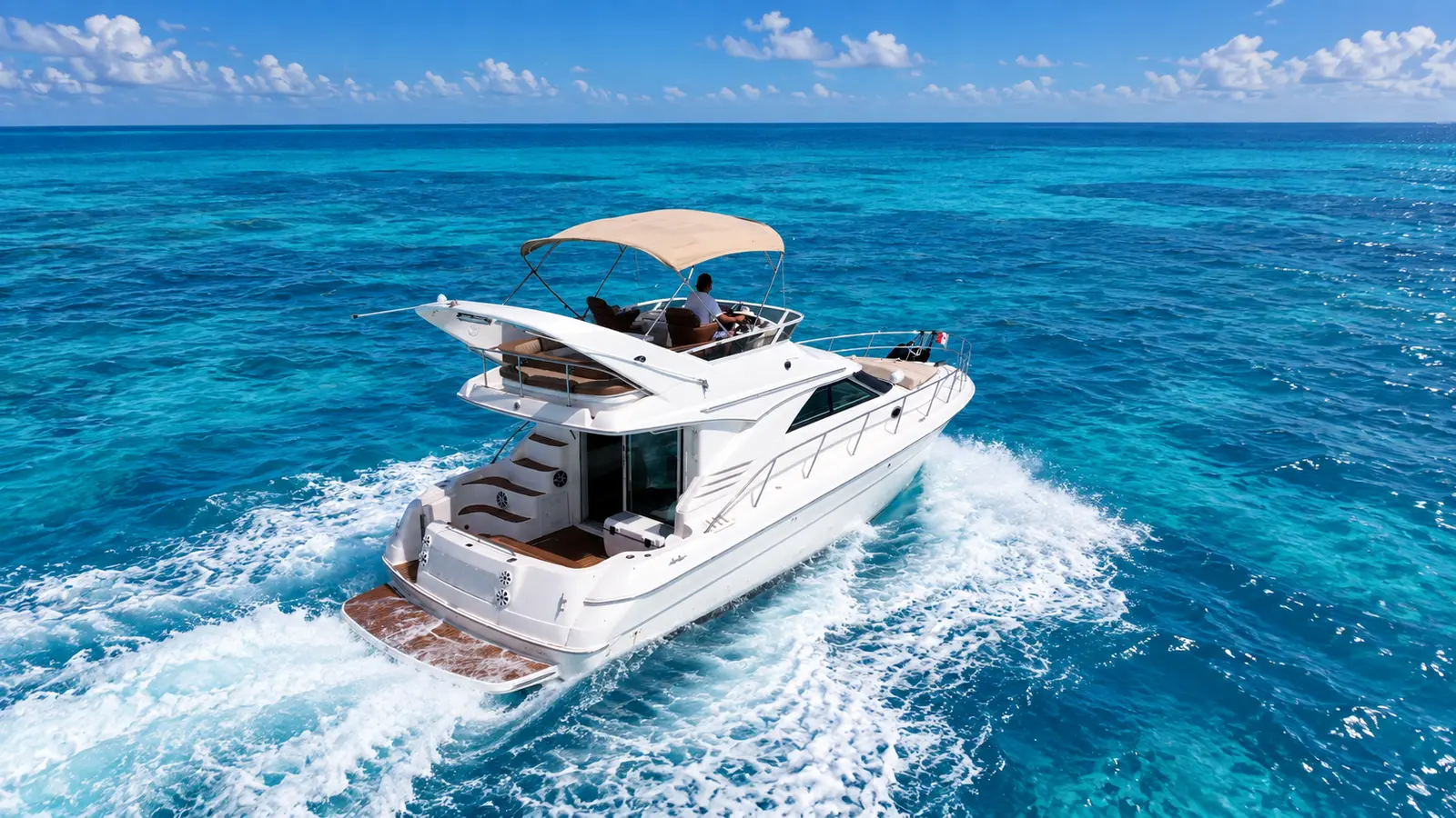 Return Cruise - Drinks and music back along the Hotel Zone to the marina, at golden hour on the afternoon slot