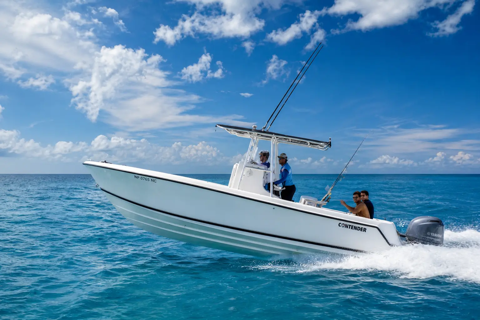 Guests aboard a center-console speedboat cruising across blue water off Punta Cana