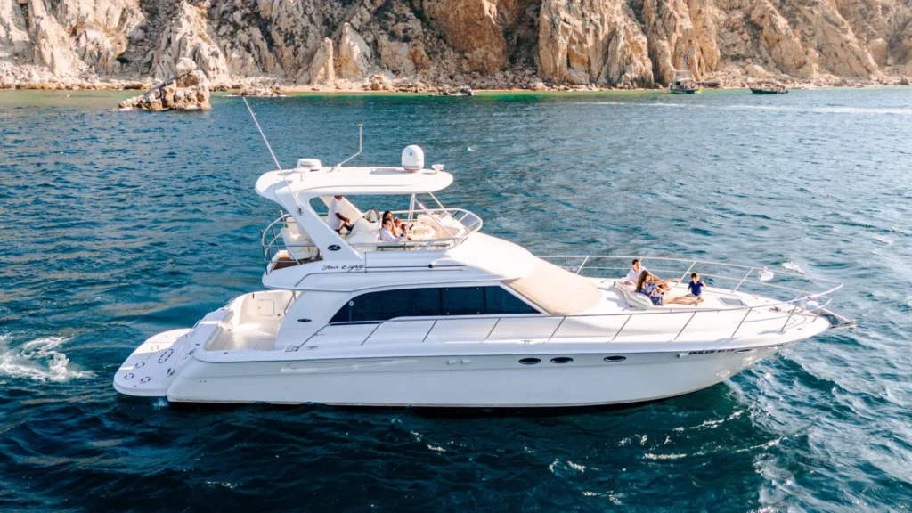 Luxury yacht cruising along the coast of Cabo San Lucas, a popular choice for things to do in Cabo San Lucas.