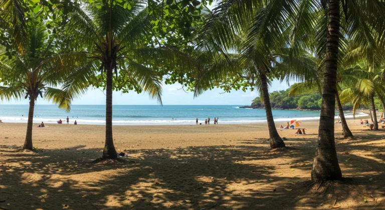 Playa Langosta with golden sand, calm waves in Costa Rica