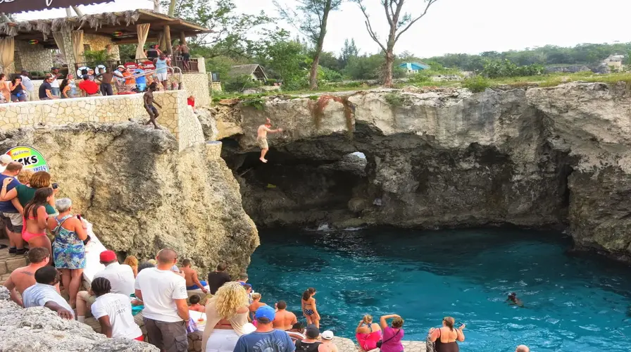 2. Visit Rick’s Cafe for Cliff Jumping and Sunsets