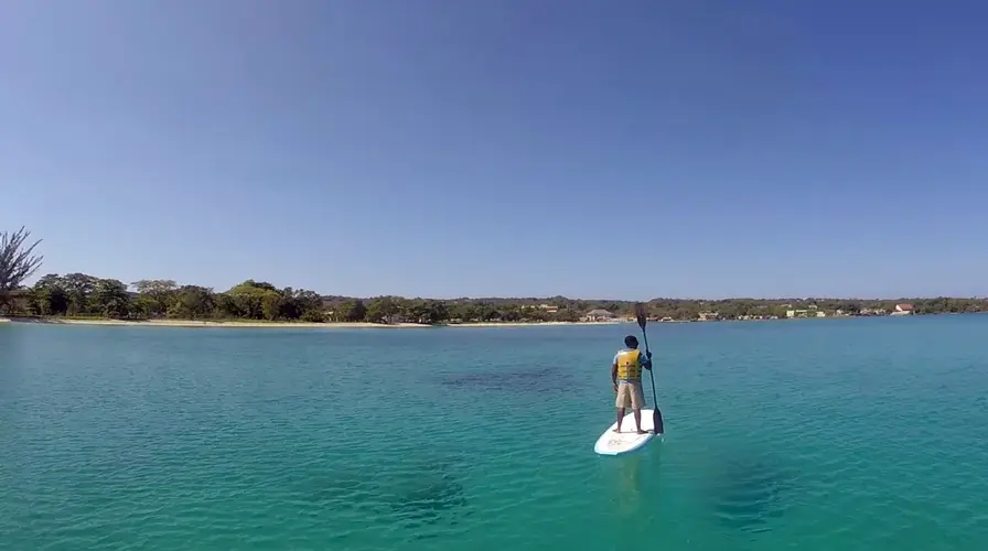 3. Cove Hopping and Paddleboarding - Top Things to Do in Negril in June on a Catamaran
