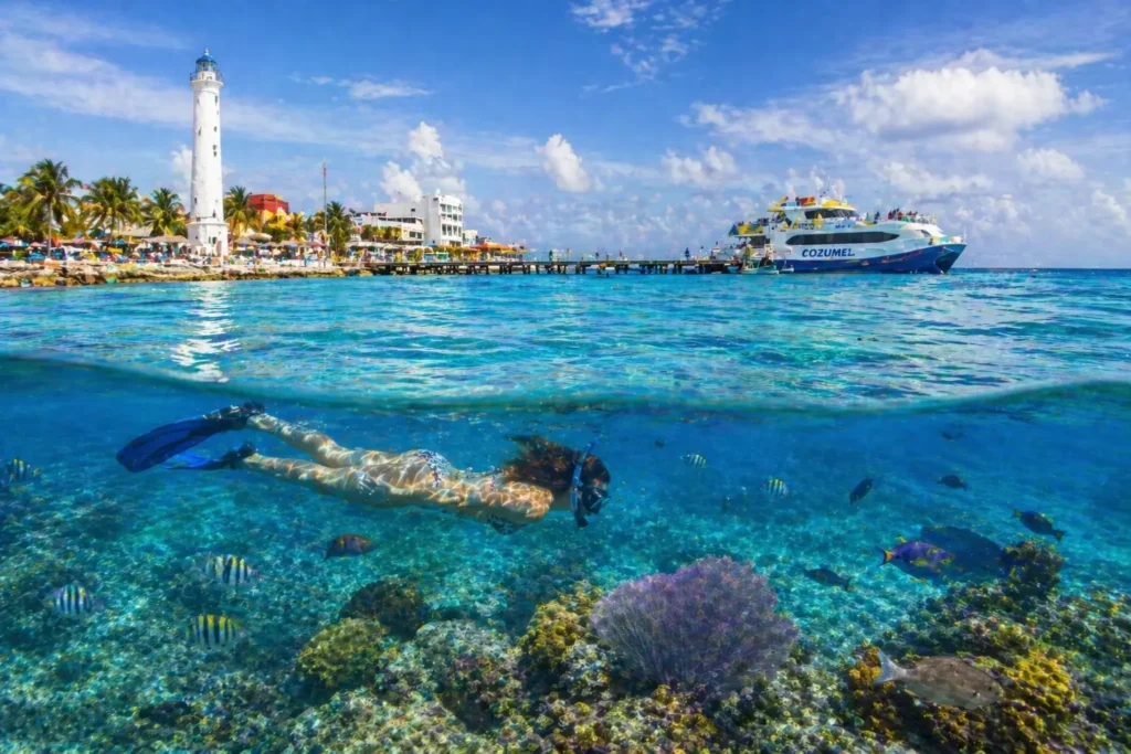Cozumel island snorkeling reef with clear water and marine life showing a top place to visit in Cancun for diving and ocean activities