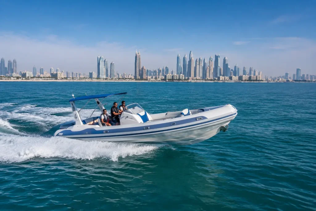 White speedboat cruising on Dubai waters with passengers and the city skyline in the background
