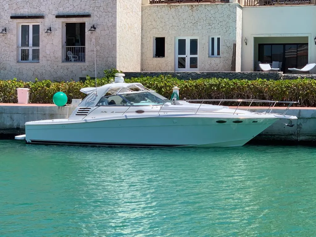 Cap Cana Weather December with a private yacht docked at a luxury marina, highlighting ideal boating conditions and calm Caribbean waters.